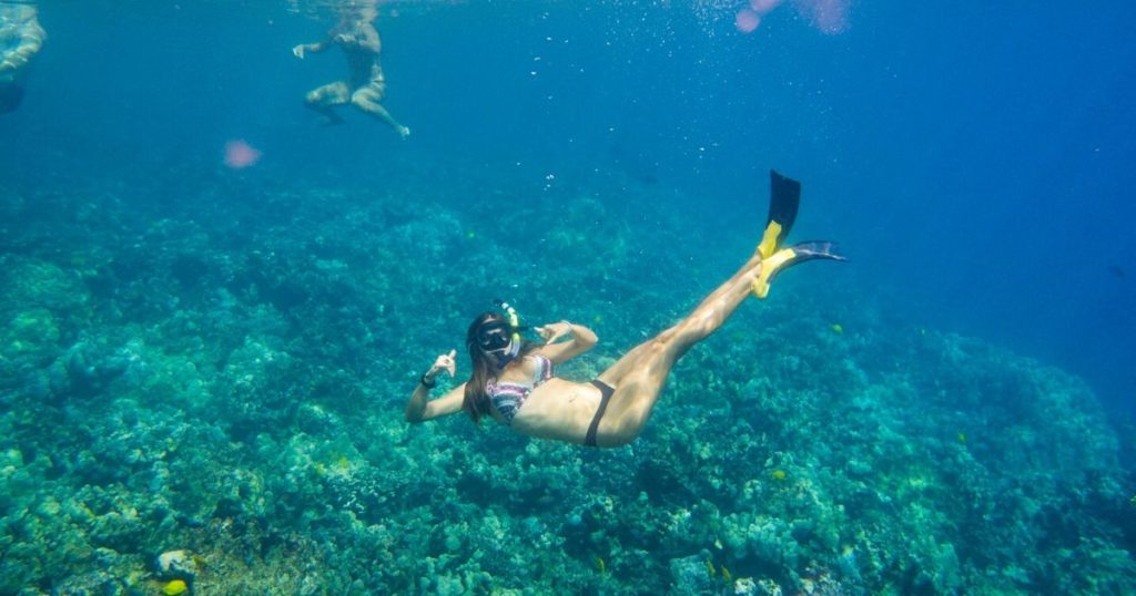 Woman snorkeling underwater